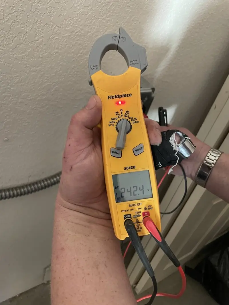 Voltage testing with clamp meter during Aluminum Wiring Replacement in Fairfax